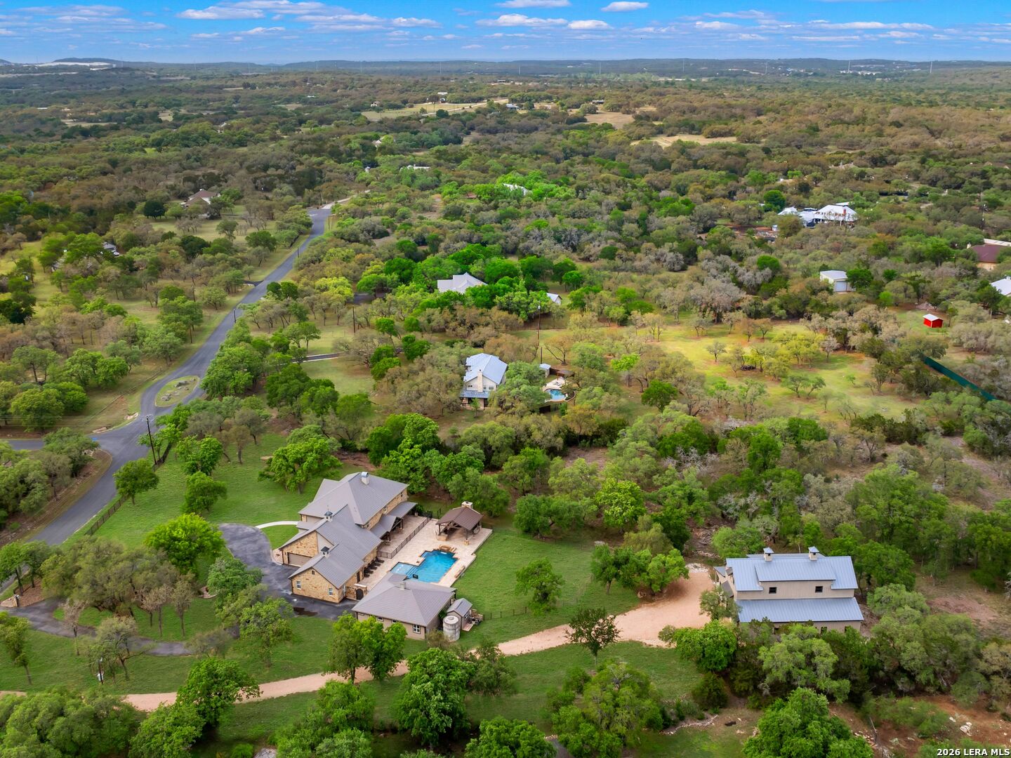 103 South Cibolo Hollow Fair Oaks Ranch, TX 78015 - Photo 71 of 79 an aerial view of residential house with outdoor space and trees