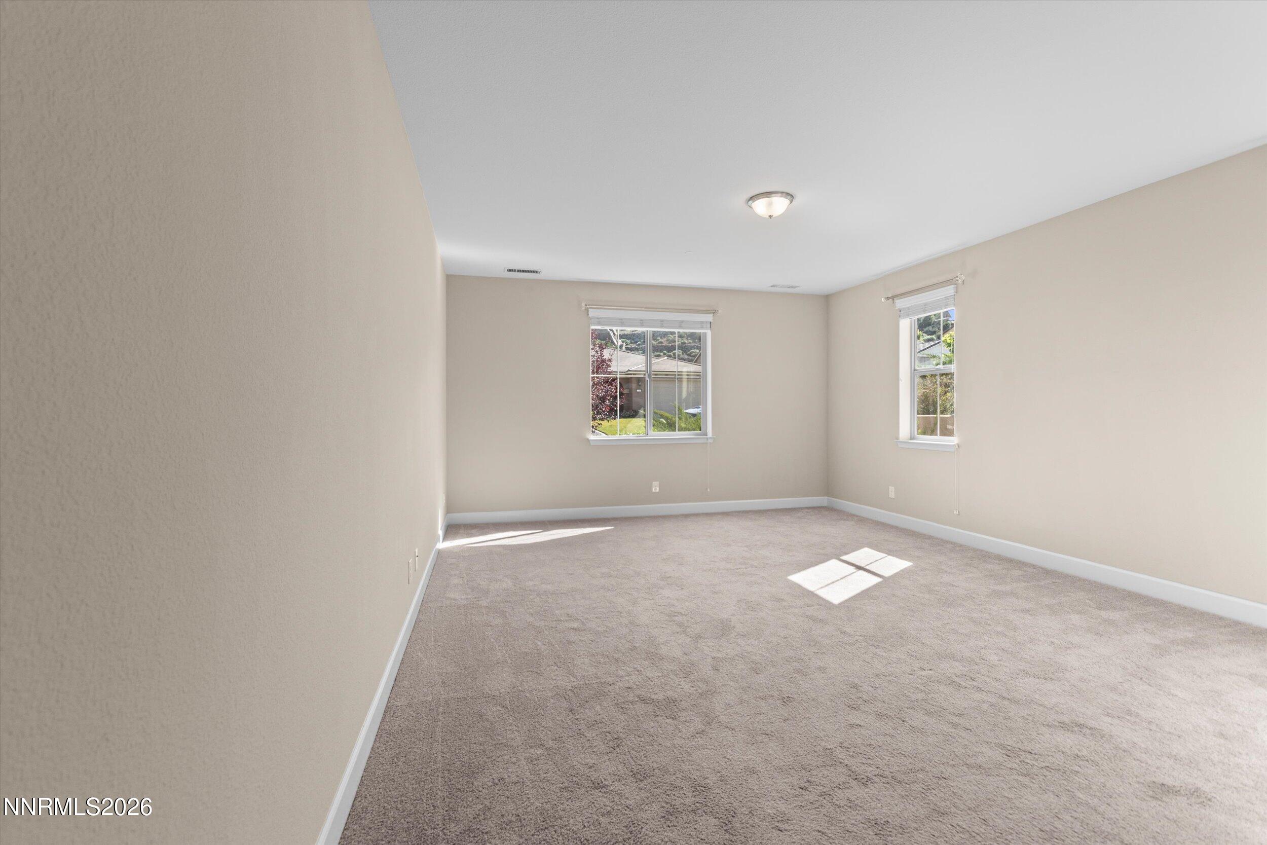 1725 Verdi Vista Court Reno, NV 89523 - Photo 16 of 37 an empty room with windows
