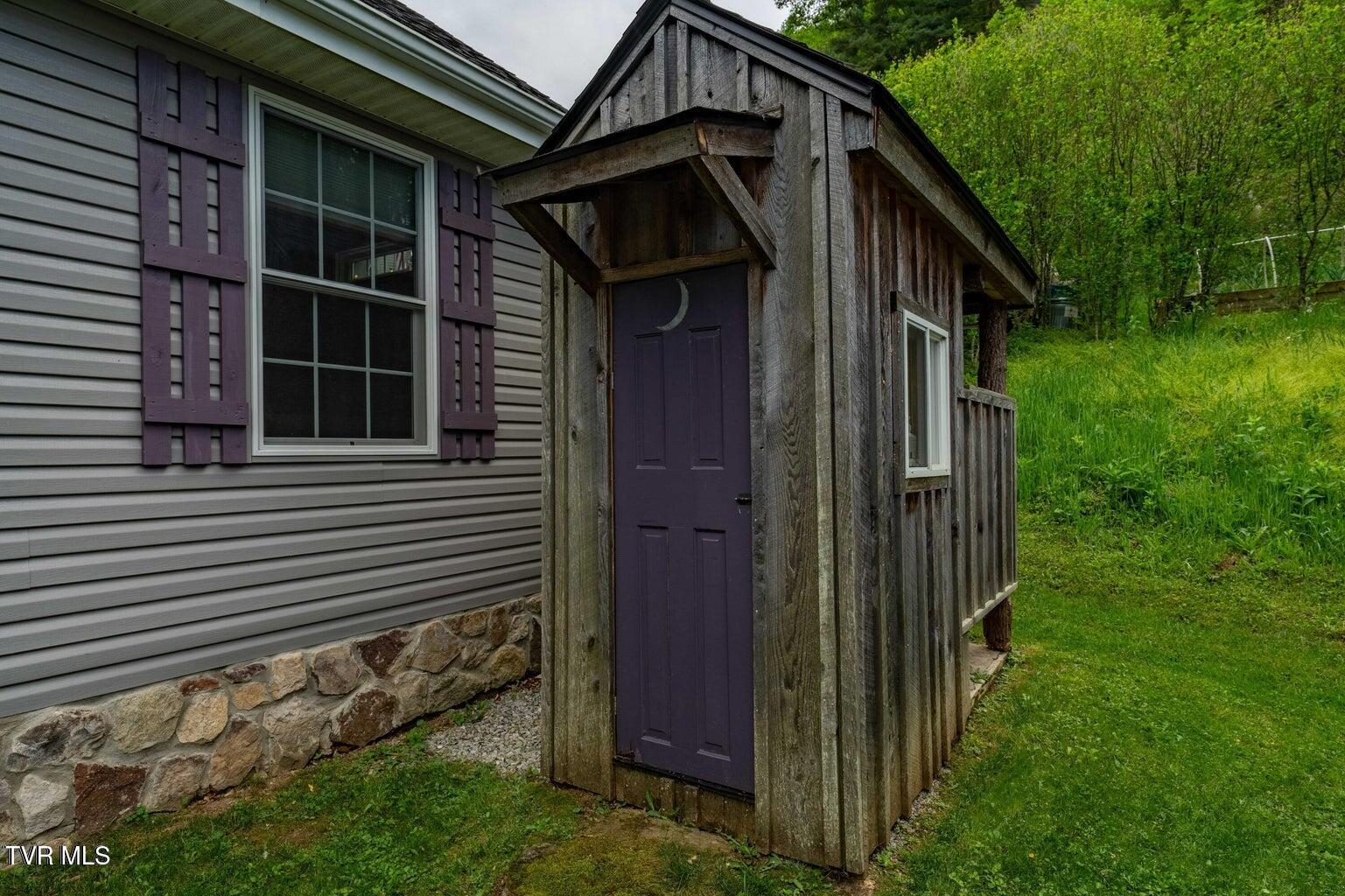 150 Rice Road, Unit TR 1 Flag Pond, TN 37657 - Photo 81 of 87 Outdoor Shower and Outhouse