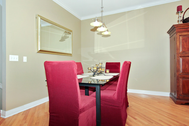 1638 South Indiana Avenue, Unit 4 Chicago, IL 60616 - Photo 7 of 14 a view of a dining room with furniture and wooden floor