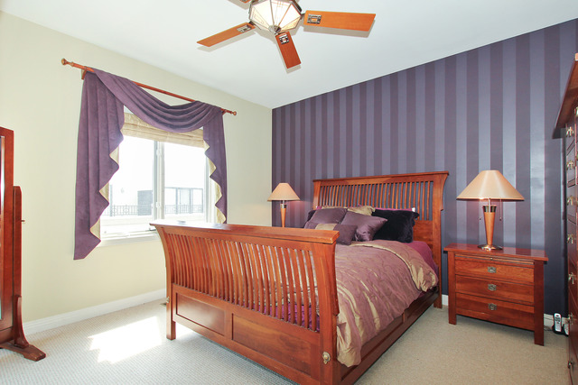 1638 South Indiana Avenue, Unit 4 Chicago, IL 60616 - Photo 10 of 14 a bedroom with a bed and a window