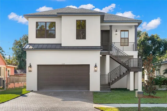 a kitchen with kitchen island a counter top a stove a sink and a refrigerator