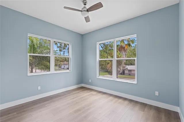 a bathroom with a sink double vanity and a shower