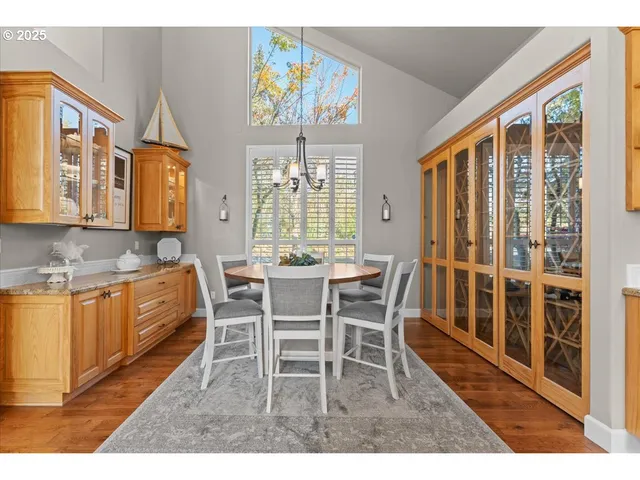 a view of walk in closet with living room