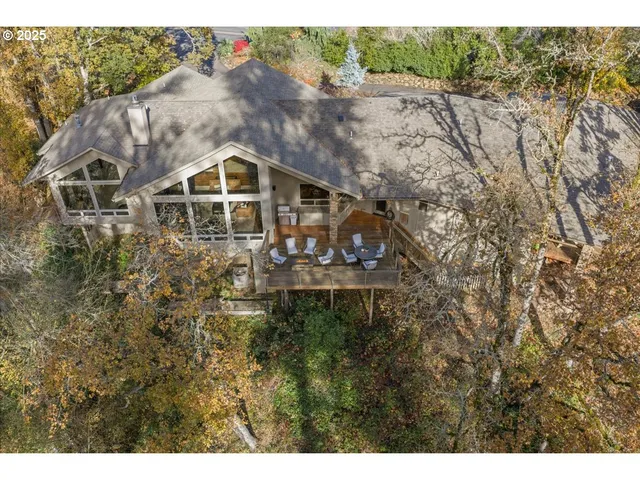 a aerial view of a house with swimming pool