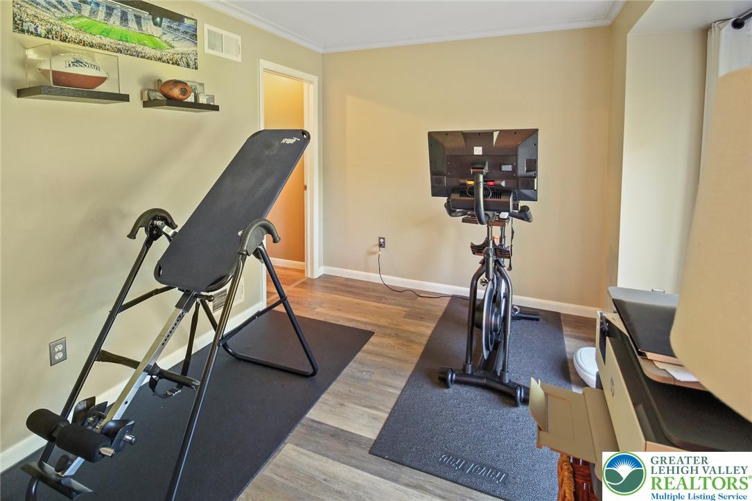 3470 Brodhead Road Bethlehem, PA 18020 - Photo 50 of 84 Hardwood-style flooring extends across this versatile room, ideal for a home gym.