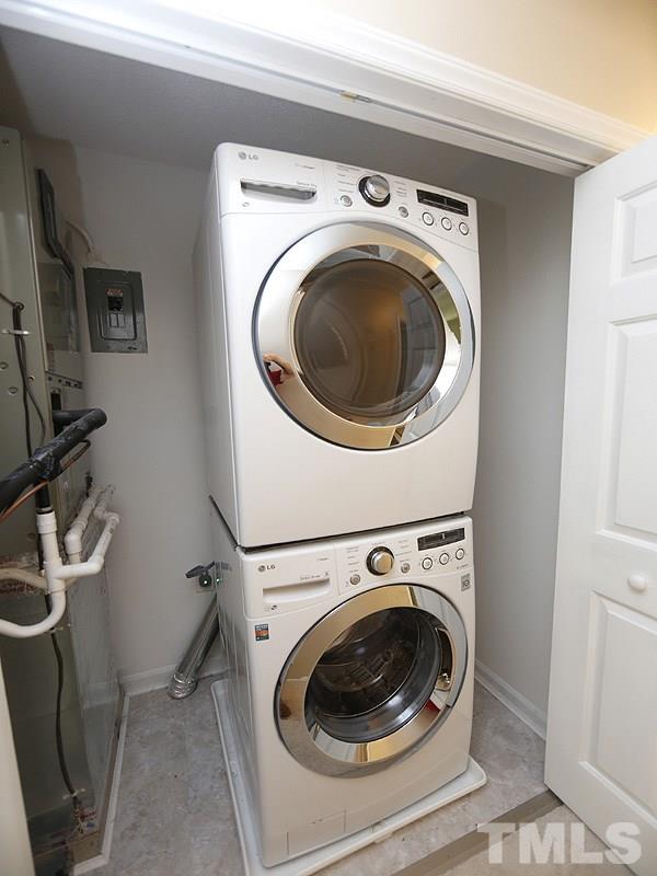 6400 Meadow View Drive Raleigh, NC 27609 - Photo 15 of 17 a utility room with dryer and washer