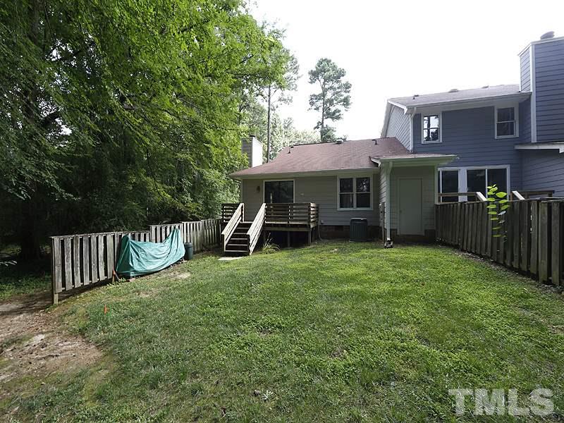 6400 Meadow View Drive Raleigh, NC 27609 - Photo 16 of 17 a view of a house with backyard and porch