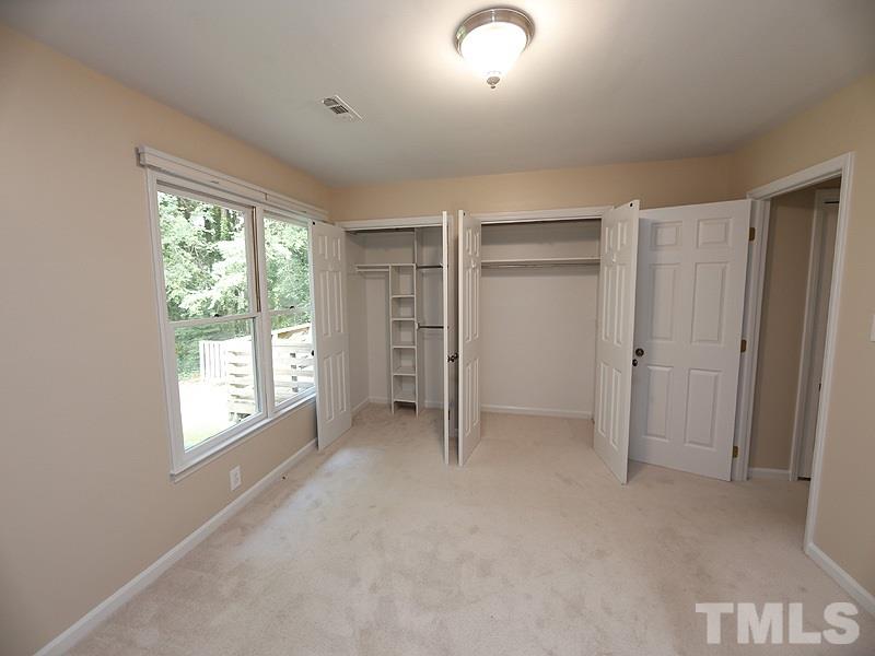 6400 Meadow View Drive Raleigh, NC 27609 - Photo 10 of 17 a view of an empty room with a window