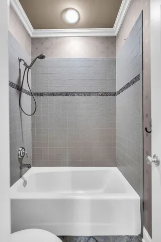 a large kitchen with stainless steel appliances granite countertop a stove a sink and a refrigerator