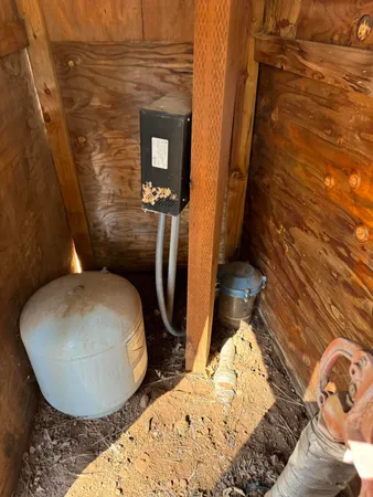 a bathroom with a toilet and a sink