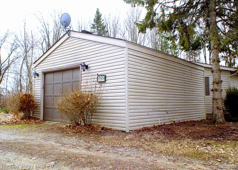 1900 Brewer Road Howell, MI 48855 - Photo 16 of 17 1 Car Garage