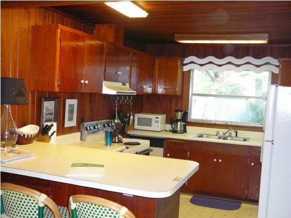 58 Garfield Street Santa Rosa Beach, FL 32459 - Photo 13 of 20 a kitchen with a sink and a stove