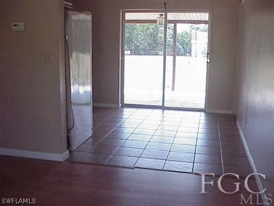 11630 Deal Road North Fort Myers, FL 33917 - Photo 4 of 9 a view of an empty room and window