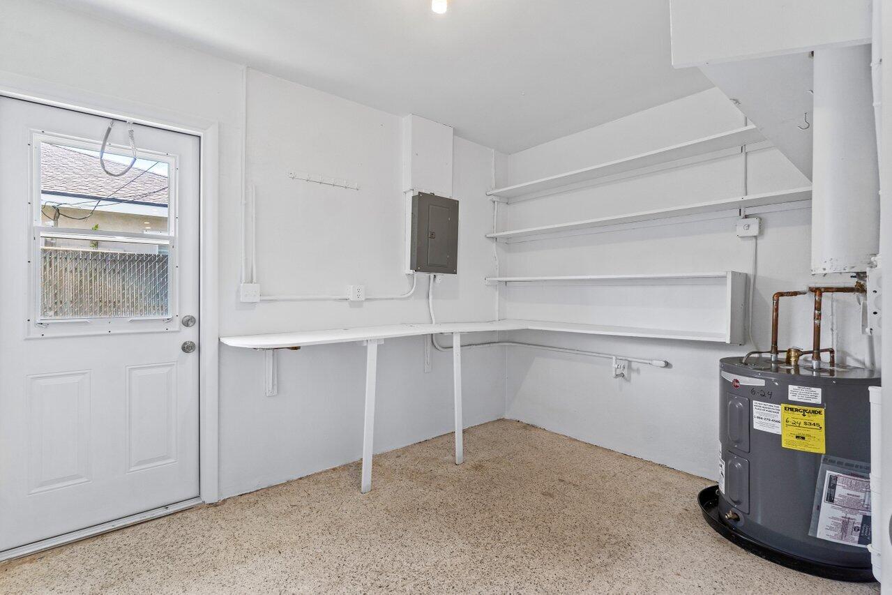 751 Hummingbird Way, Unit 7 North Palm Beach, FL 33408 - Photo 27 of 40 a view of storage and utility room with closet