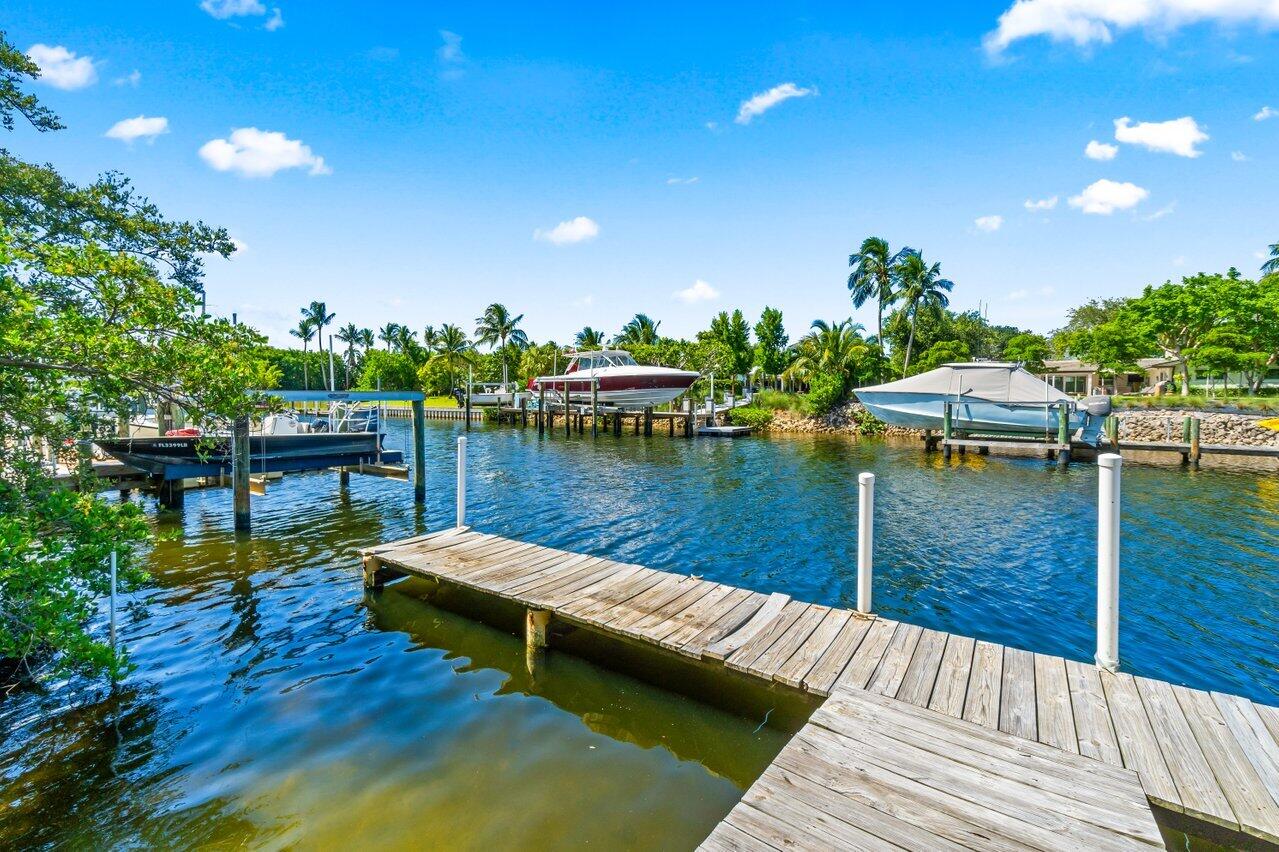 751 Hummingbird Way, Unit 7 North Palm Beach, FL 33408 - Photo 40 of 40 a view of a lake from balcony