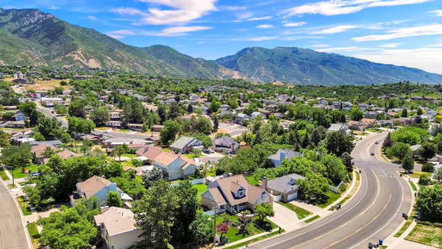 4792 Glasmann Way South Ogden, UT 84403 - Photo 18 of 70 Residential community with tree-lined streets and mountain backdrop