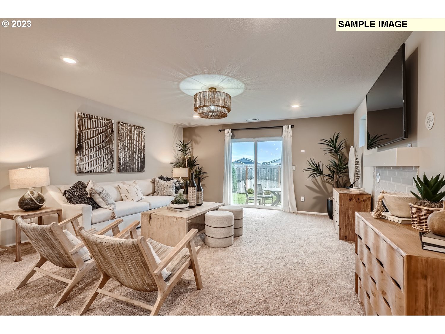 1058 Clemson Street Gervais, OR 97026 - Photo 15 of 20 a living room with furniture and a flat screen tv