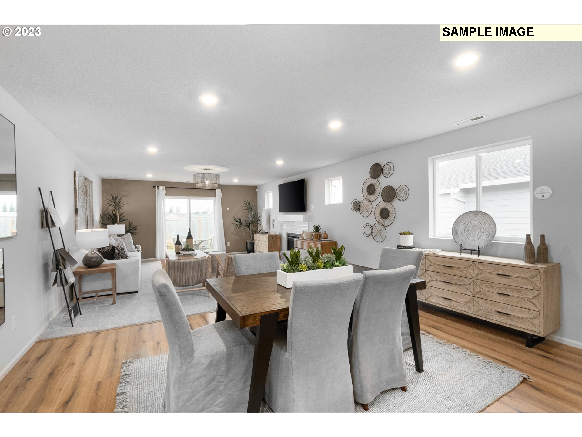 1058 Clemson Street Gervais, OR 97026 - Photo 17 of 20 a living room with furniture flat screen tv and couches chair