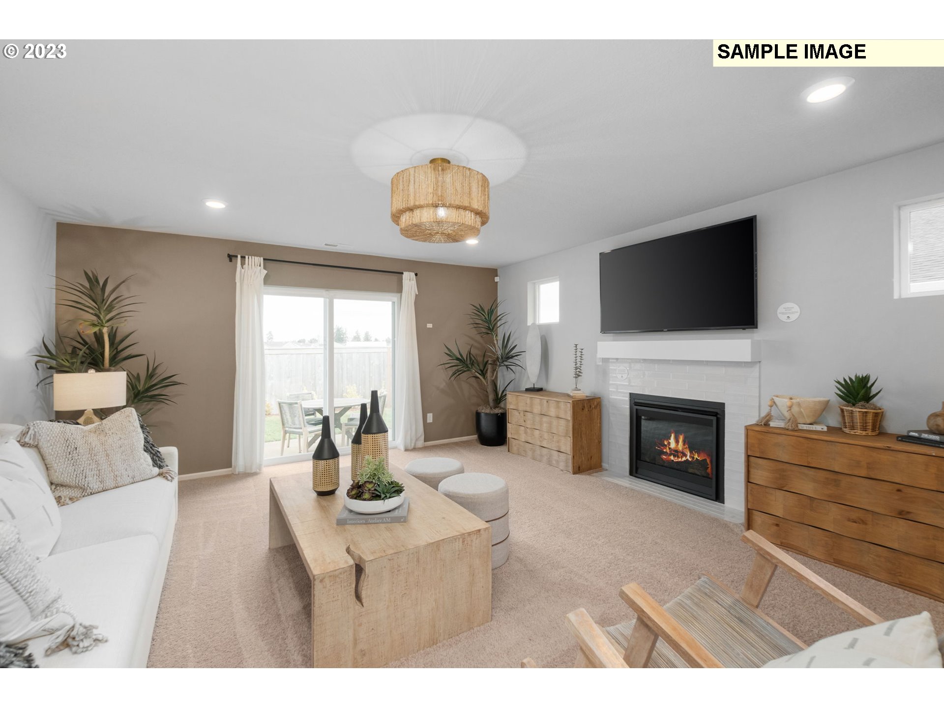 1058 Clemson Street Gervais, OR 97026 - Photo 20 of 20 a living room with furniture a fireplace and a flat screen tv