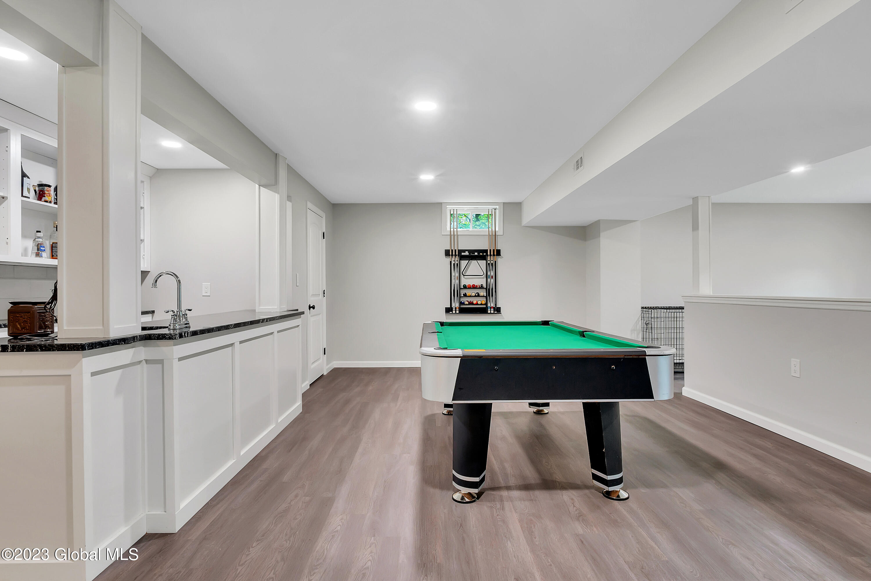 67 Clothier Road Corinth, NY 12822 - Photo 45 of 62 Bar to Pool Area with Halfwall