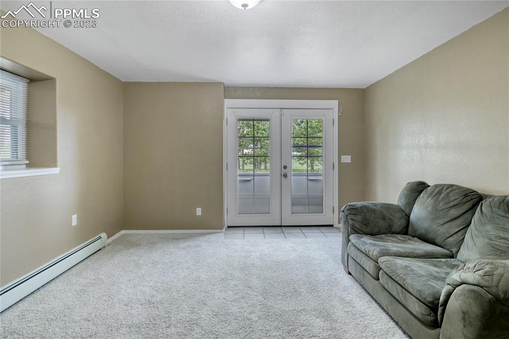 12595 Mc Cune Road Black Forest, CO 80106 - Photo 27 of 44 Rec. room in the basement that walks out to patio!