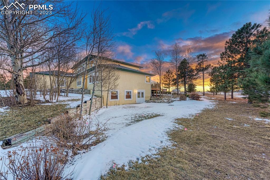 12595 Mc Cune Road Black Forest, CO 80106 - Photo 34 of 44 a view of road with large trees