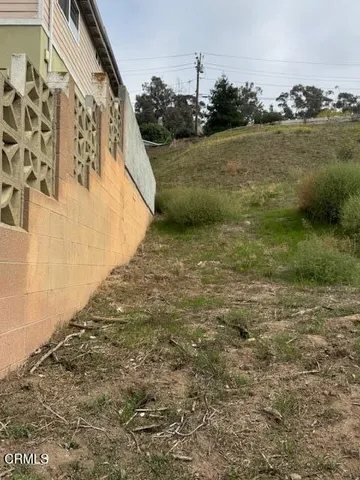 a view of a water with mountains in the background