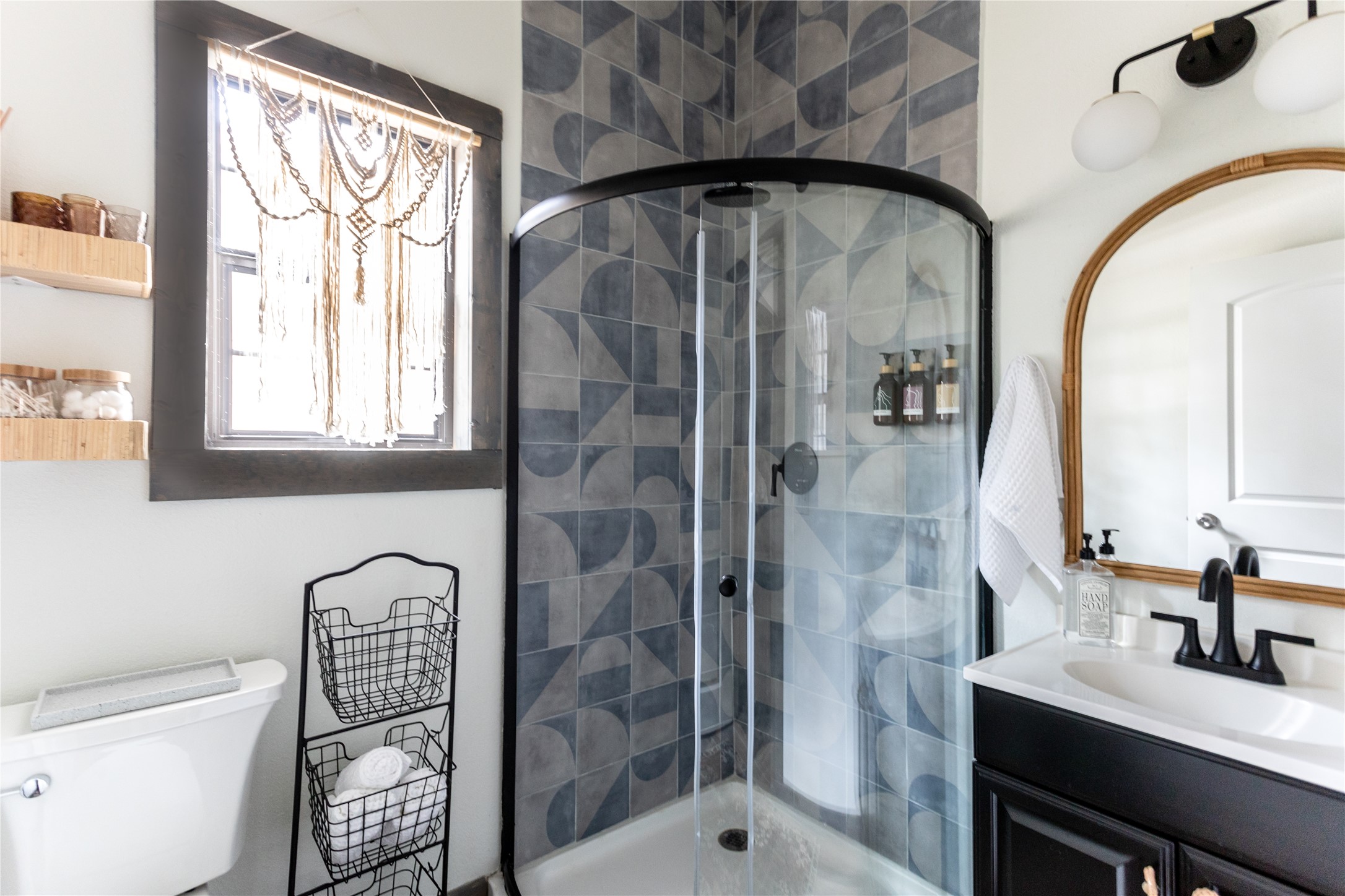 336 Coventry Road Spicewood, TX 78669 - Photo 18 of 32 Bathroom featuring vanity and a stall shower