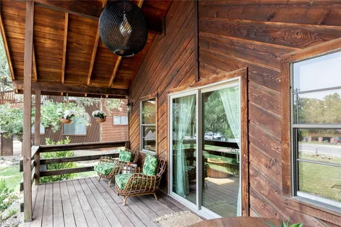 a view of backyard with a patio