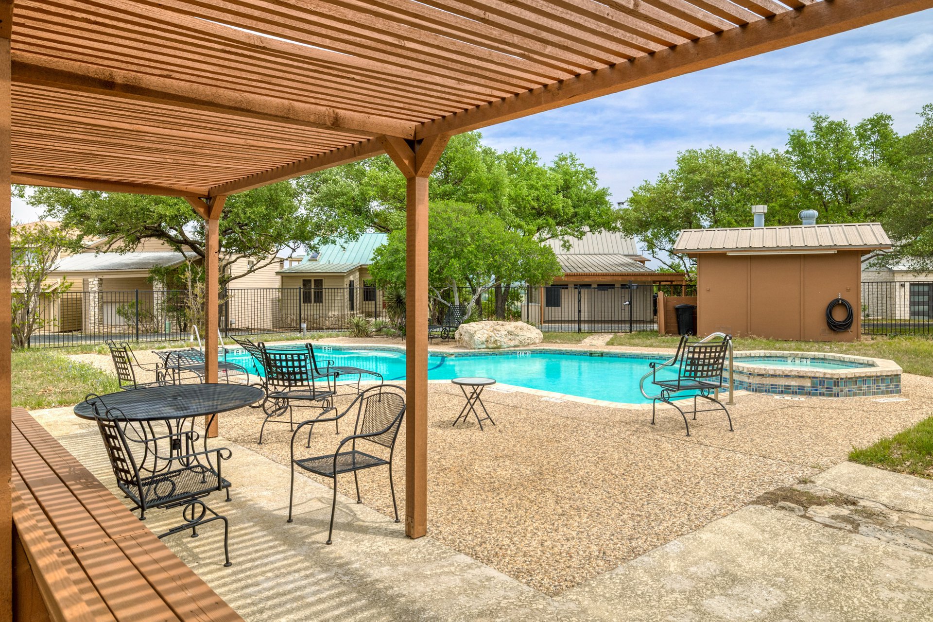 336 Coventry Road Spicewood, TX 78669 - Photo 29 of 32 View of swimming pool with a patio area, a pergola, and a pool with connected hot tub