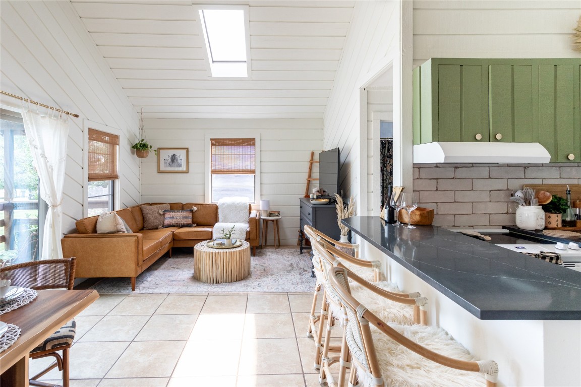 336 Coventry Road Spicewood, TX 78669 - Photo 6 of 32 a living room with furniture and a fireplace