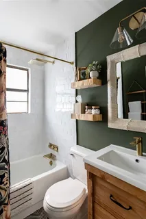 a bathroom with a sink a toilet and a bathtub