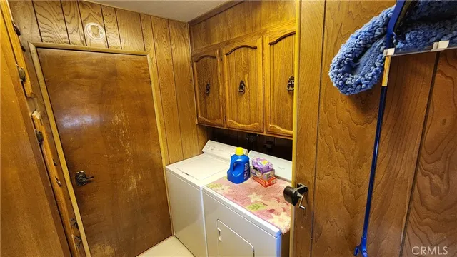 a bathroom with a sink a mirror and shower