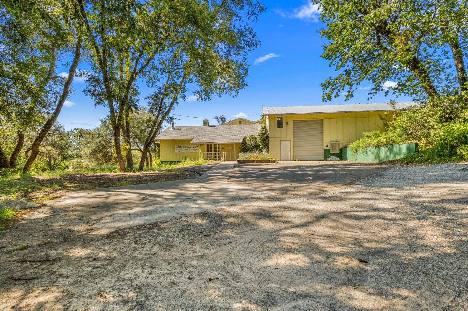 8221 Stoney Creek Road Somerset, CA 95684 - Photo 8 of 44 a front view of a house with a yard