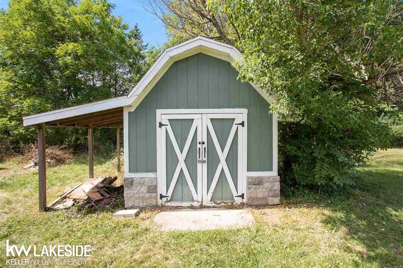 34344 Armada Ridge Road Richmond, MI 48062 - Photo 13 of 36 In addition to the large garage, this home also has a storage shed for the lawn equipment.