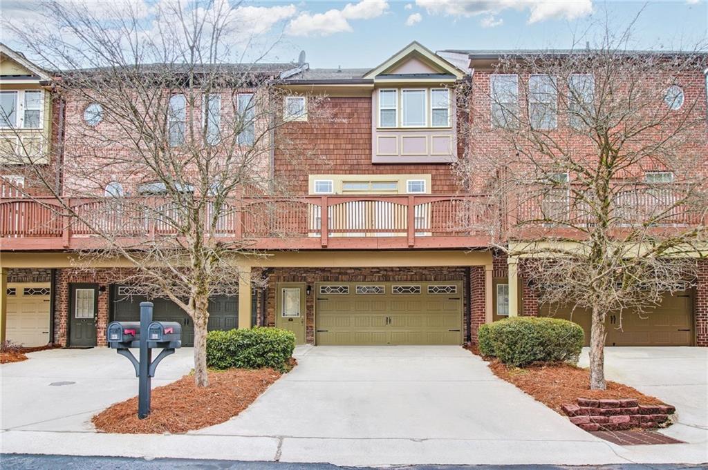 13 High Top Road Sandy Springs, GA 30328 - Photo 32 of 34 a front view of a house with yard