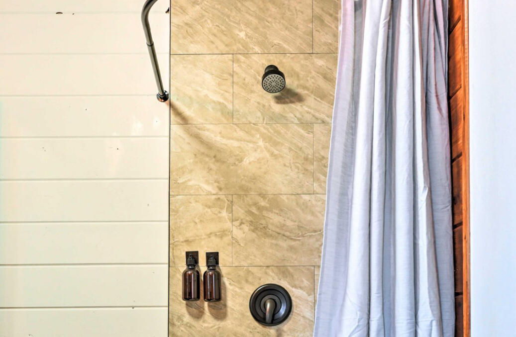 42036 Tollhouse Road Shaver Lake, CA 93664 - Photo 17 of 30 a bathroom with a shower and a sink
