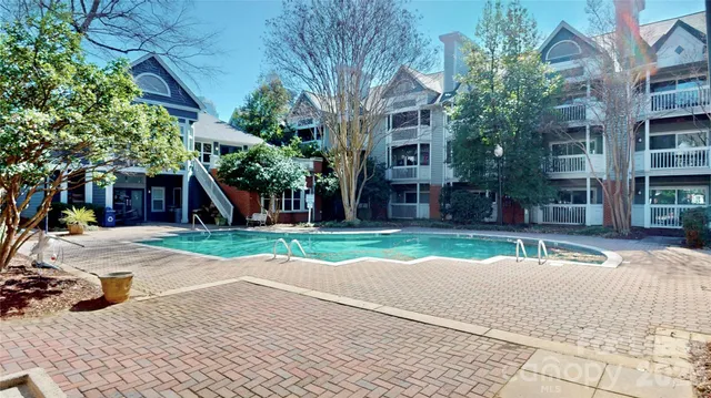 a view of street with tall buildings