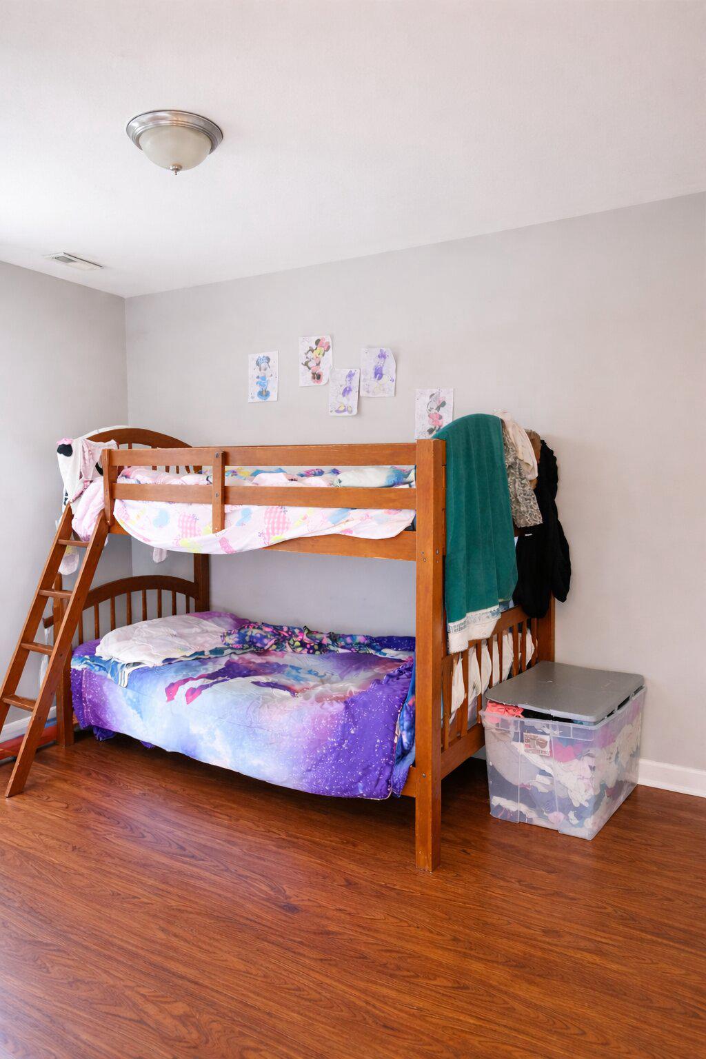 3908 Fairfax Road Baltimore, MD 21216 - Photo 10 of 24 Cozy bunk bed in a bright room.