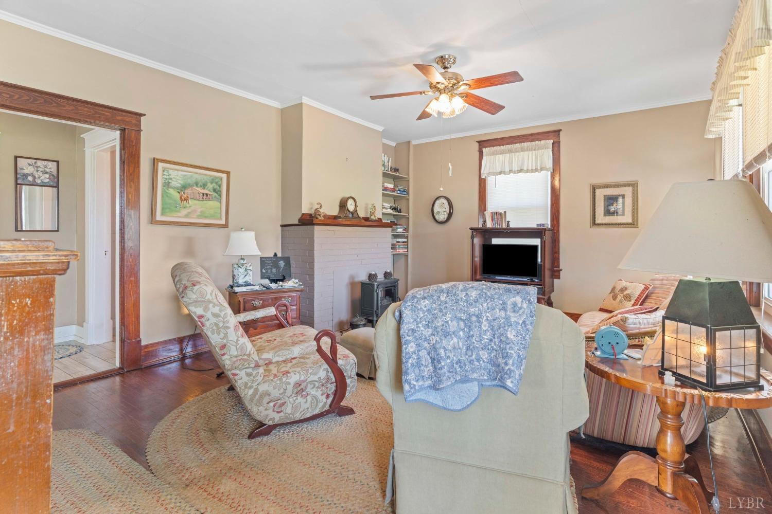 1876 Dickie Road Roseland, VA 22967 - Photo 13 of 75 a living room with furniture and a chandelier
