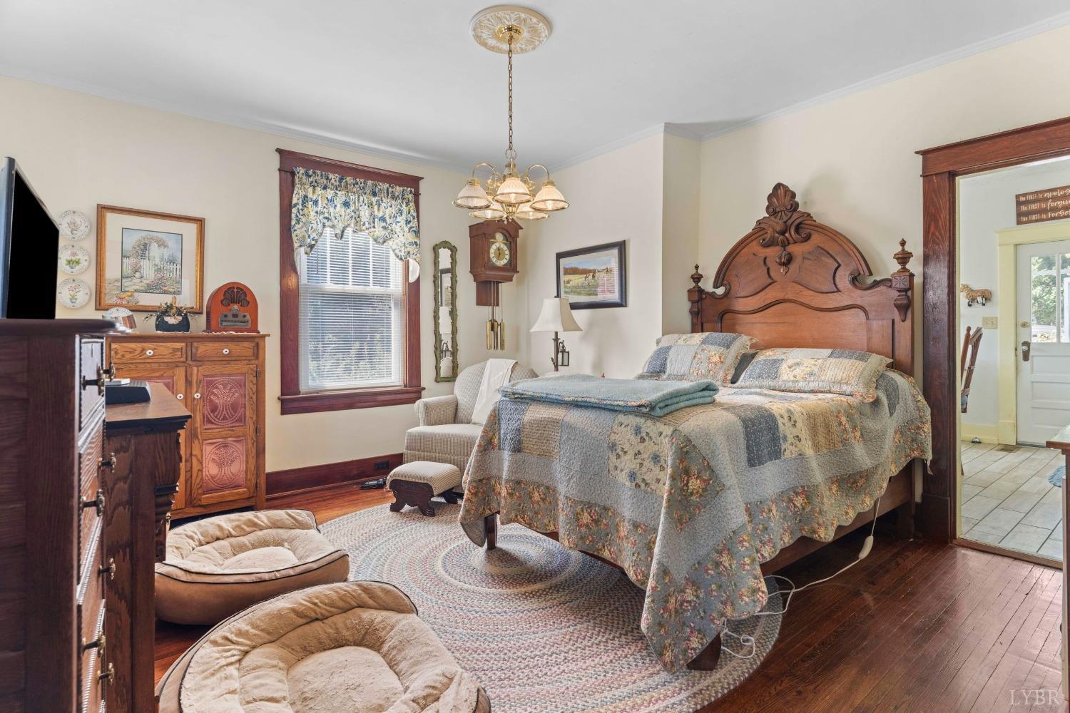 1876 Dickie Road Roseland, VA 22967 - Photo 16 of 75 a bedroom with a bed and wooden floor