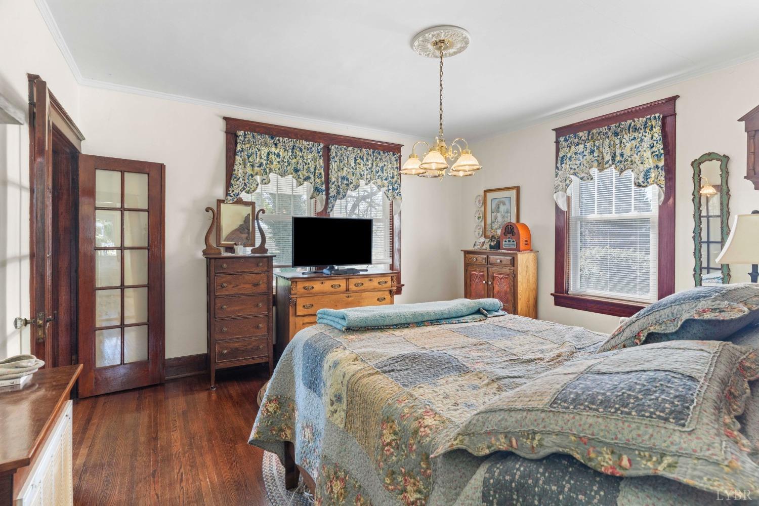 1876 Dickie Road Roseland, VA 22967 - Photo 18 of 75 a bedroom with a bed and a flat screen tv