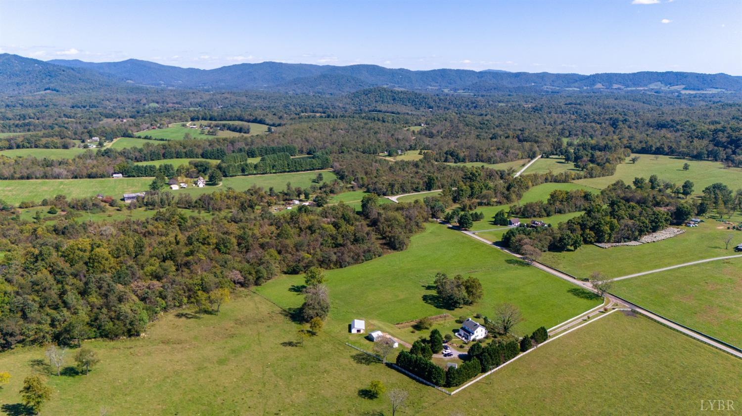 1876 Dickie Road Roseland, VA 22967 - Photo 2 of 75 an aerial view of a golf course with parking space