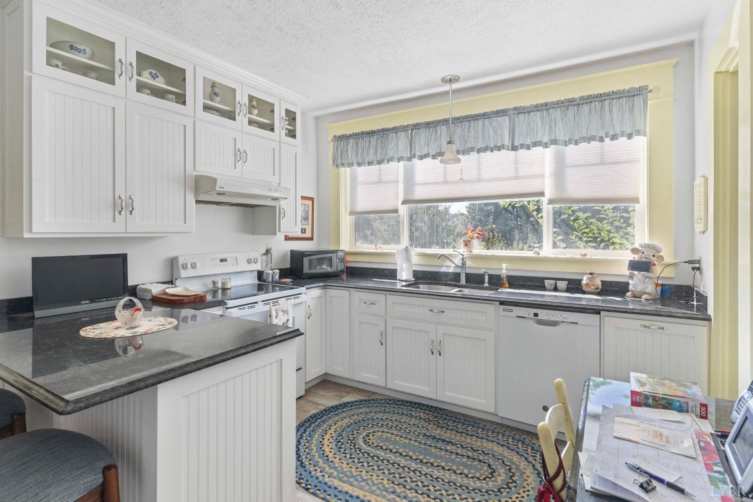 1876 Dickie Road Roseland, VA 22967 - Photo 25 of 75 a kitchen with a sink stove and window