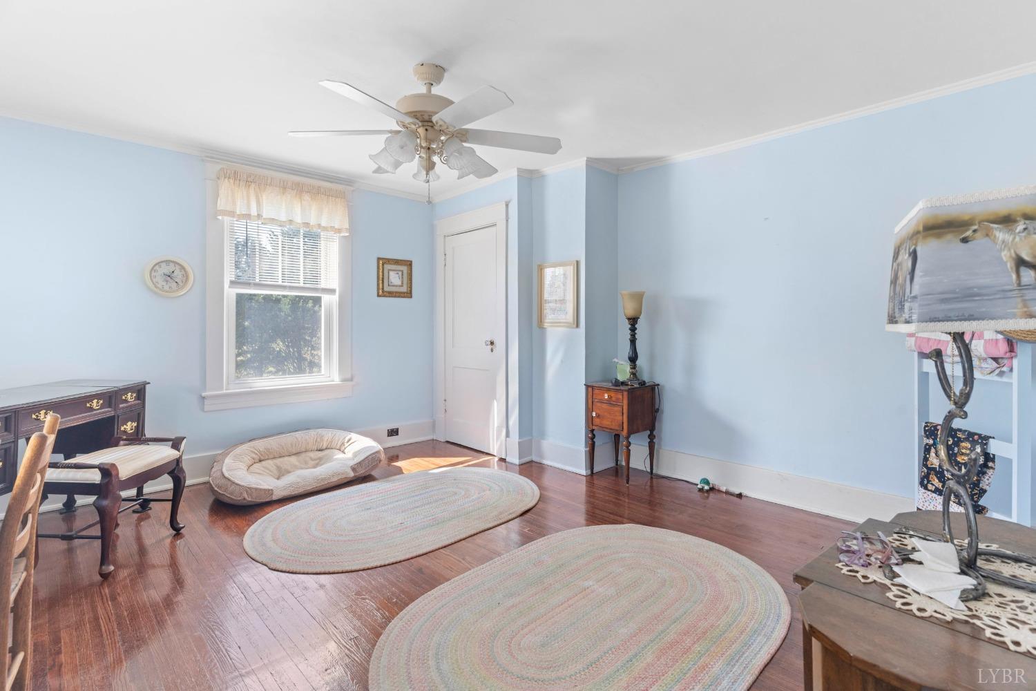 1876 Dickie Road Roseland, VA 22967 - Photo 40 of 75 a bedroom with a bed and wooden floor