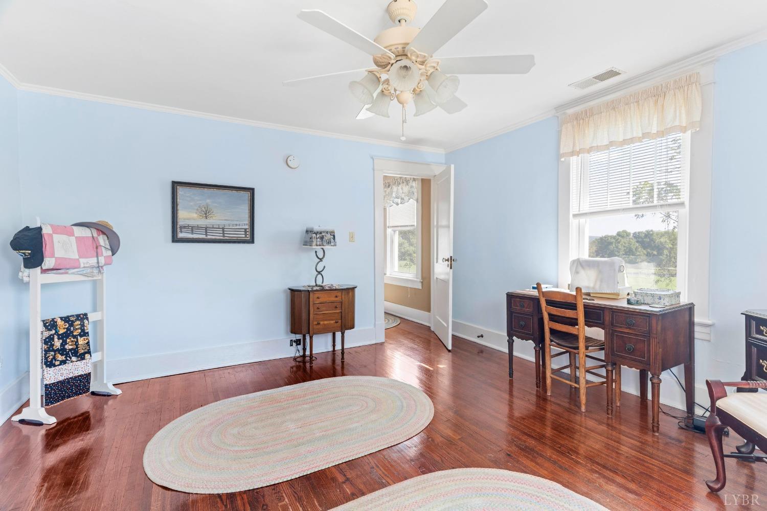 1876 Dickie Road Roseland, VA 22967 - Photo 41 of 75 a dining room with furniture a rug and wooden floor