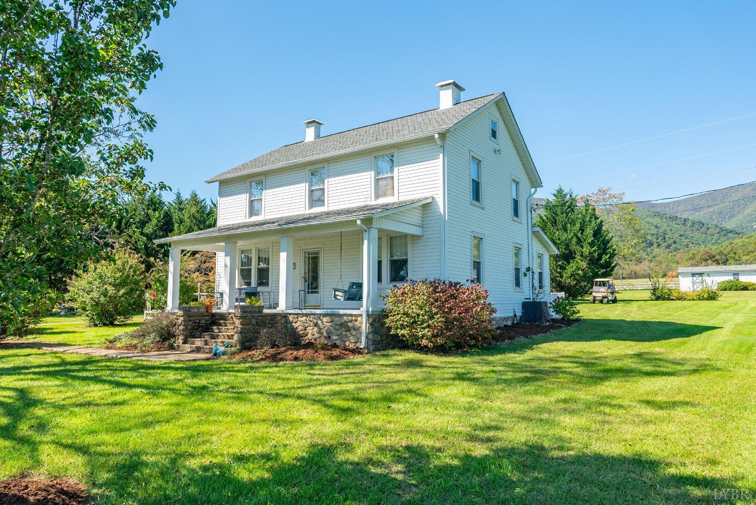 1876 Dickie Road Roseland, VA 22967 - Photo 5 of 75 a front view of house with yard and outdoor seating