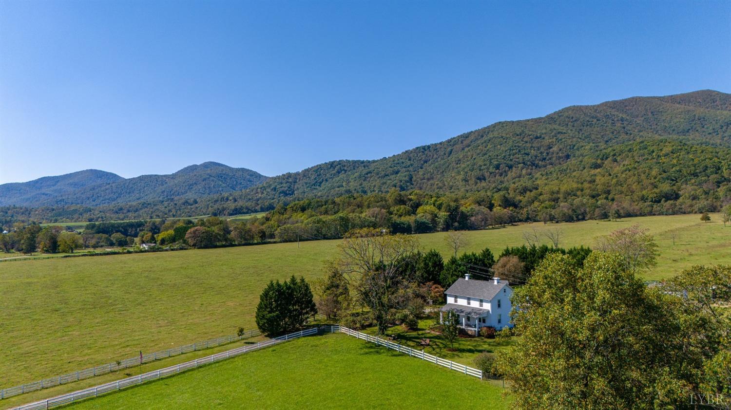 1876 Dickie Road Roseland, VA 22967 - Photo 7 of 75 a view of a lake with a mountain view