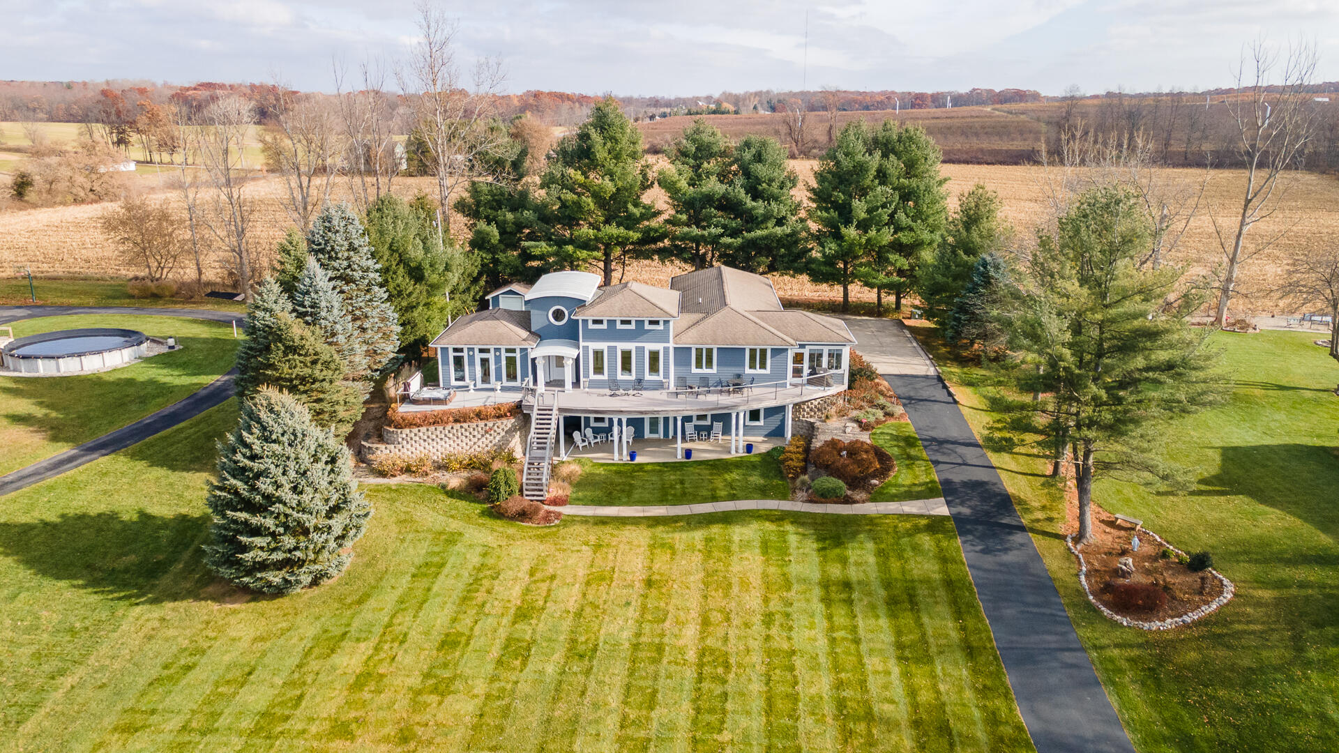 11864 5 Mile Road Northeast Lowell, MI 49331 - Photo 2 of 59 Luxury Exterior